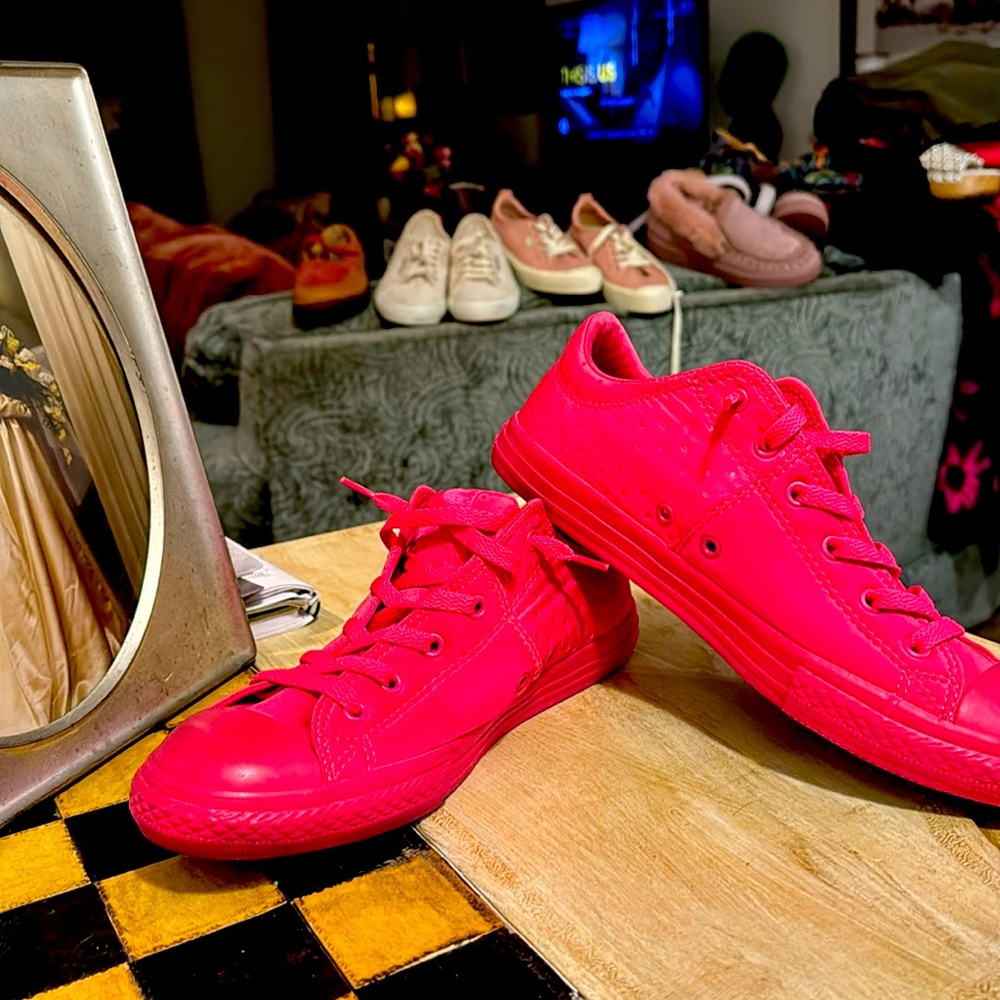 Hot pink converse shoes